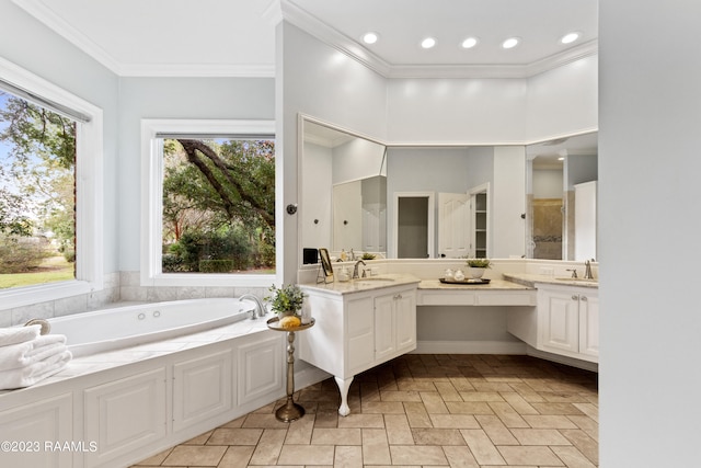 bathroom with dual vanity, plenty of natural light, tile flooring, and a tub