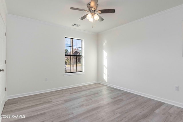 unfurnished room with light hardwood / wood-style flooring, ceiling fan, and crown molding