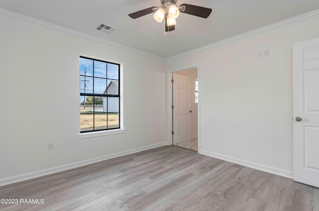 unfurnished room with ceiling fan, crown molding, and light hardwood / wood-style flooring