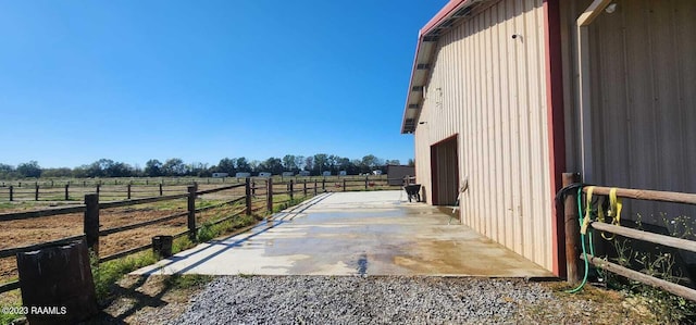 view of terrace featuring a rural view