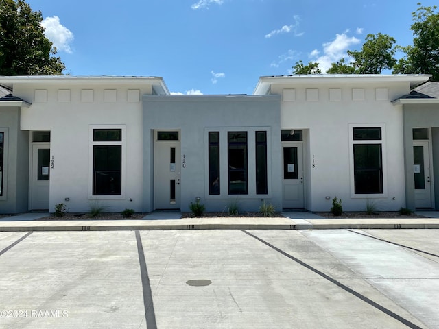 back of house with a patio area