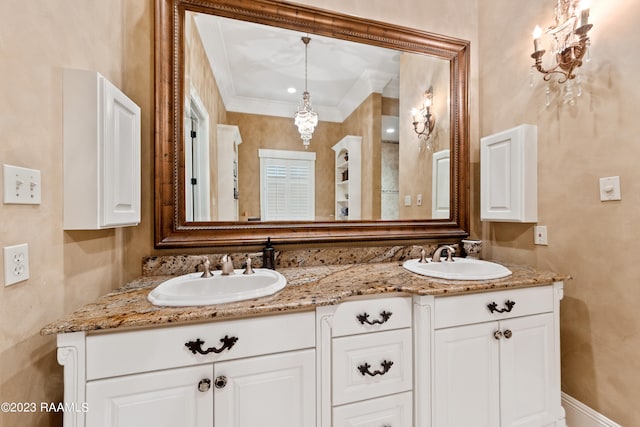 bathroom featuring vanity and crown molding