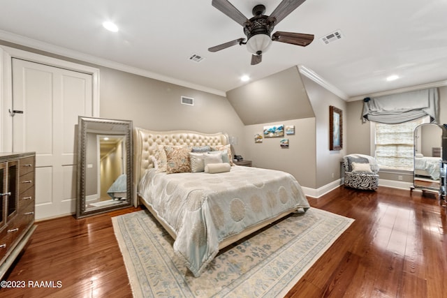 bedroom featuring lofted ceiling, crown molding, ceiling fan, and dark wood-type flooring