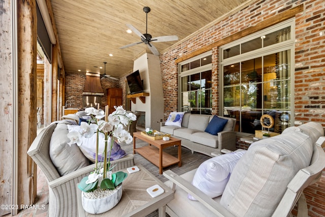 interior space featuring an outdoor living space and ceiling fan