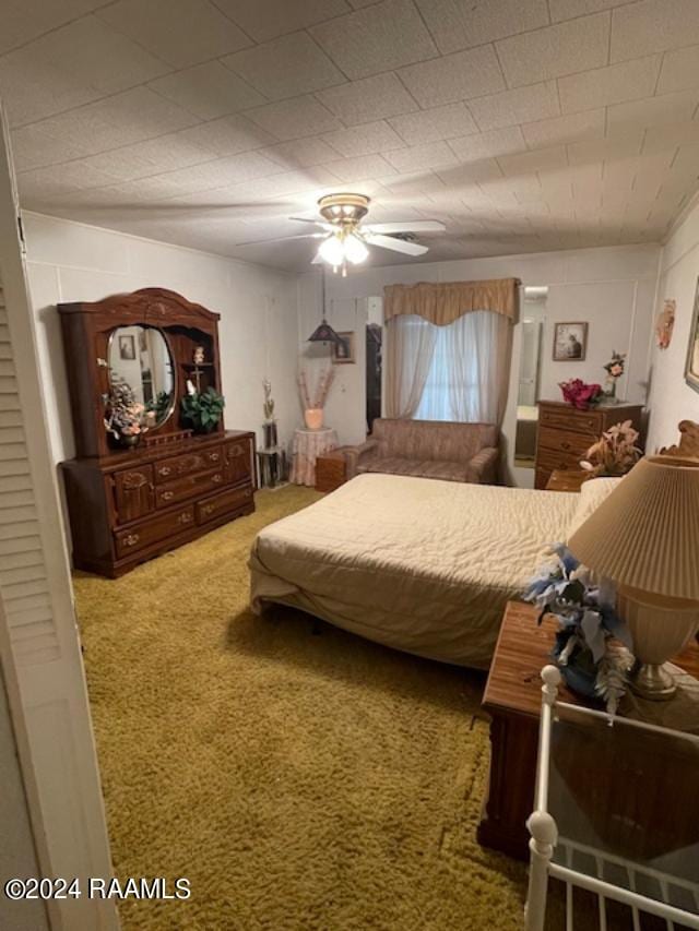105 S 1st St, Gueydan, LA 70542 - bedroom with carpet flooring and ceiling fan