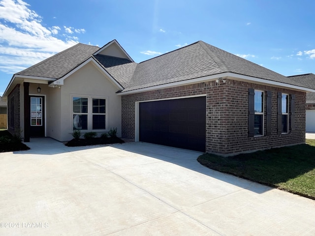 view of front of home featuring a garage