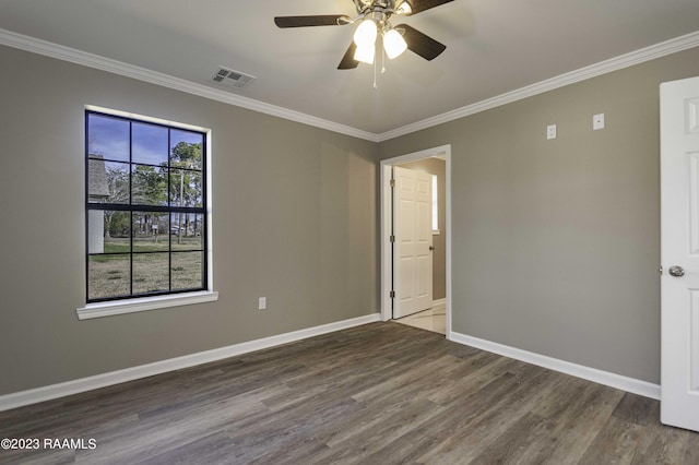 unfurnished room featuring hardwood / wood-style floors, ceiling fan, and ornamental molding