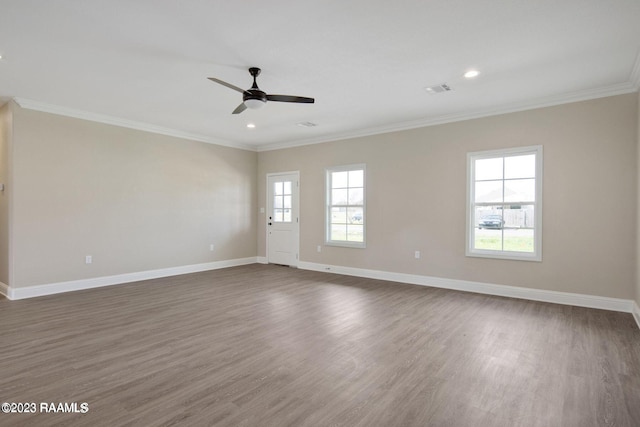 unfurnished room featuring ceiling fan, recessed lighting, wood finished floors, baseboards, and ornamental molding