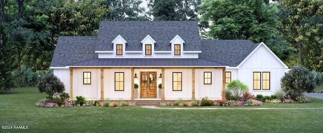 view of front of home with covered porch and a front lawn