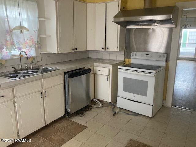 kitchen with white cabinetry, white electric stove, sink, dishwasher, and wall chimney exhaust hood