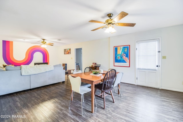 dining space featuring dark hardwood / wood-style flooring and ceiling fan