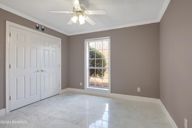 unfurnished bedroom featuring light tile floors, multiple windows, crown molding, and ceiling fan