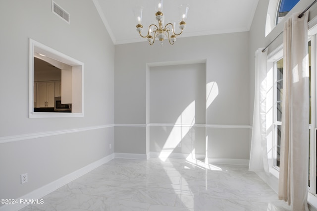 tiled empty room with a chandelier and ornamental molding