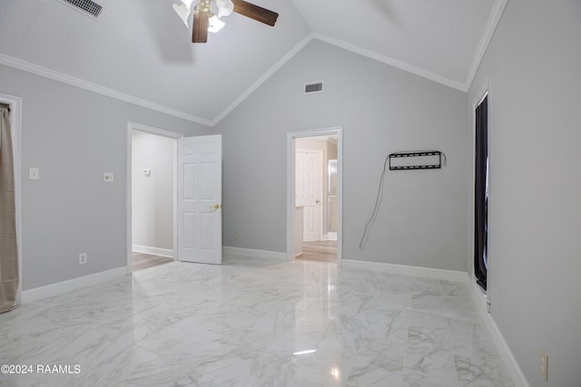 spare room with crown molding, ceiling fan, light tile floors, and lofted ceiling