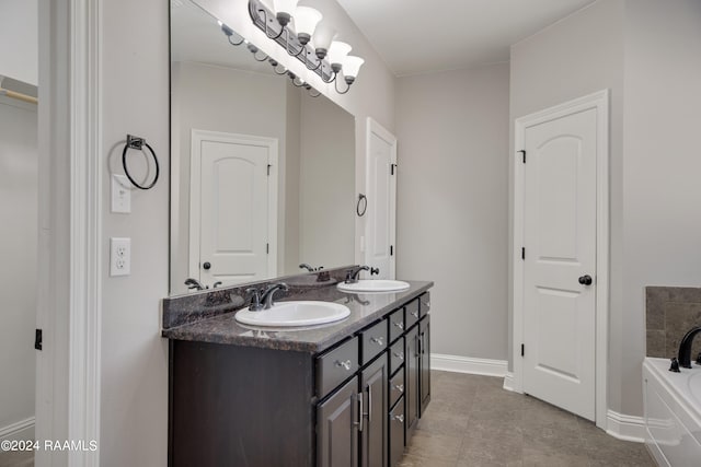 bathroom with double vanity, tile floors, and a bath