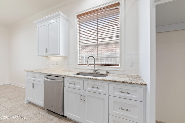 kitchen with dishwasher, backsplash, crown molding, sink, and white cabinetry