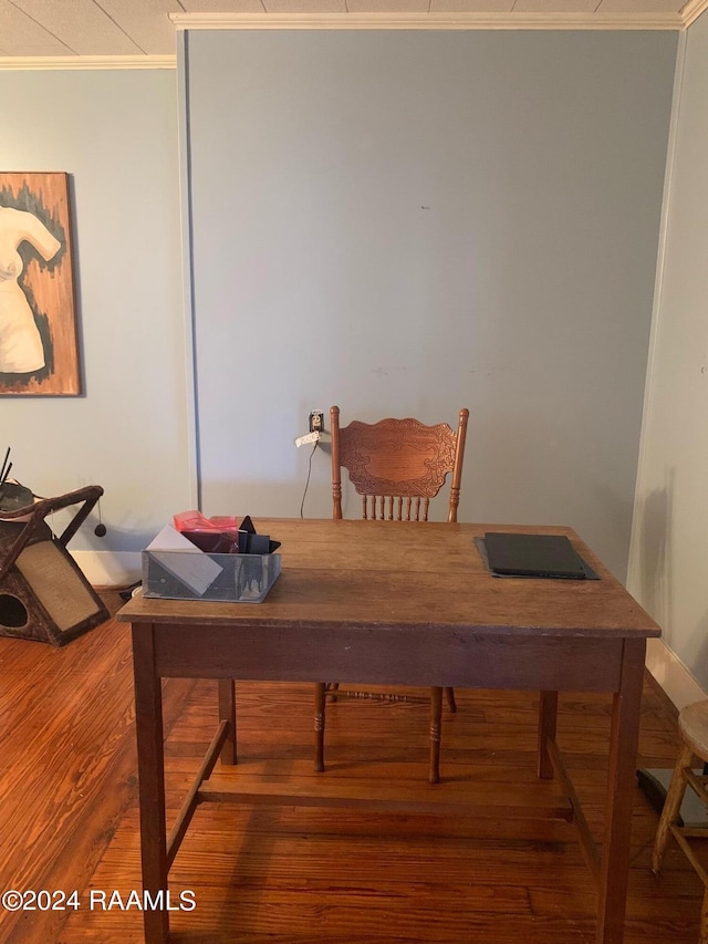 office featuring ornamental molding and dark wood-type flooring