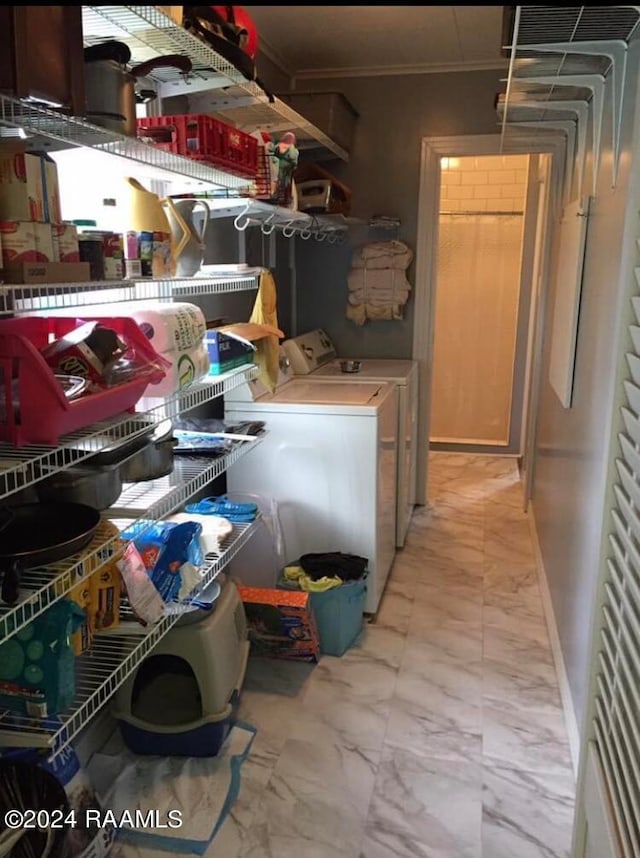 storage area with washer and dryer