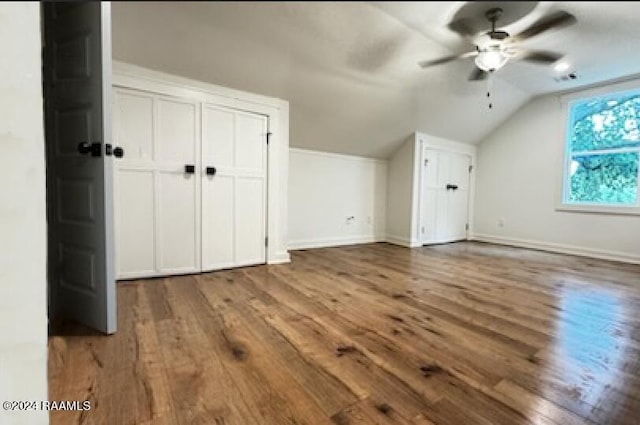 bonus room featuring vaulted ceiling, hardwood / wood-style floors, and ceiling fan