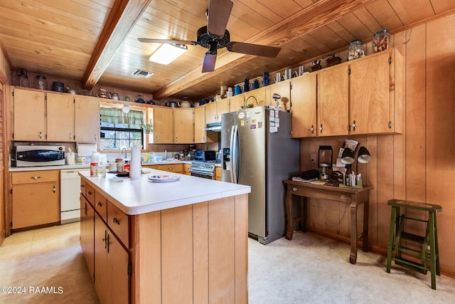 kitchen with a kitchen island, wooden ceiling, ceiling fan, beamed ceiling, and appliances with stainless steel finishes