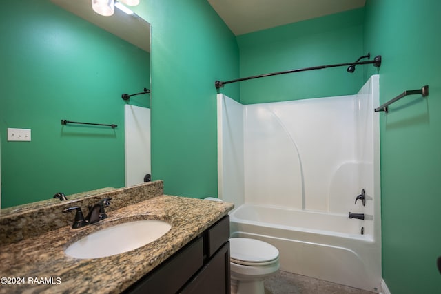 full bathroom with vanity, toilet, tile floors, and shower / bath combination