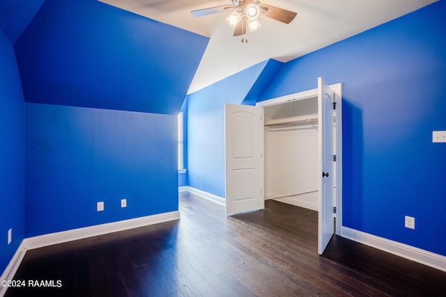 unfurnished bedroom featuring a closet, vaulted ceiling, ceiling fan, and dark hardwood / wood-style floors