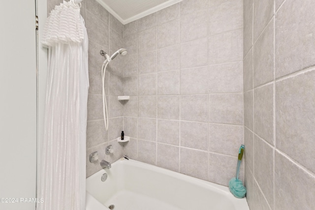 bathroom with shower / bath combination with curtain and crown molding