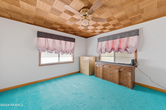 interior space featuring carpet and ceiling fan