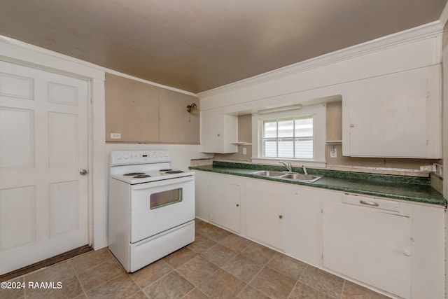 kitchen featuring electric stove, light tile floors, white cabinetry, and sink