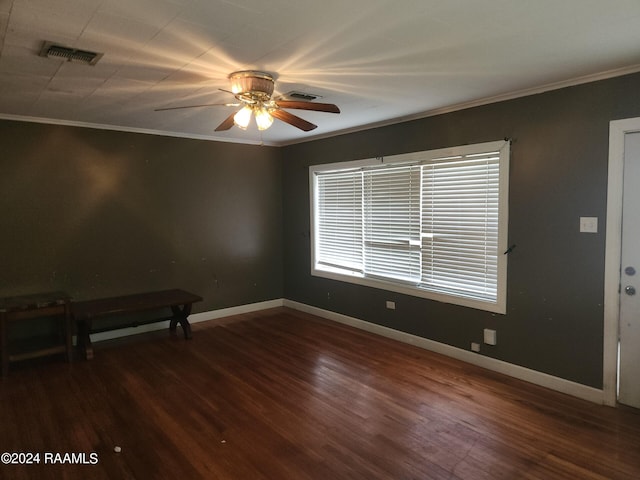 unfurnished room featuring ornamental molding, wood-type flooring, and ceiling fan