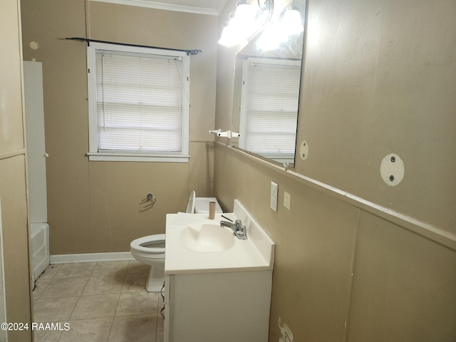 full bathroom featuring tub / shower combination, tile patterned flooring, toilet, vanity, and ornamental molding