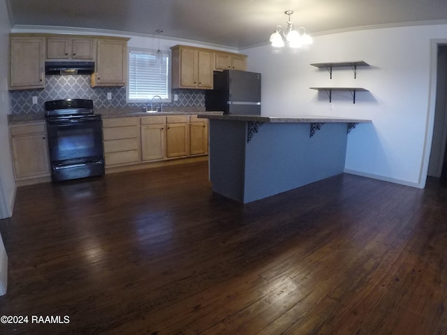 kitchen featuring dark wood-type flooring, black appliances, sink, hanging light fixtures, and a kitchen bar