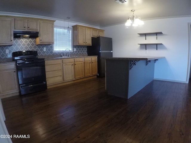 kitchen featuring hanging light fixtures, an inviting chandelier, dark hardwood / wood-style floors, a kitchen bar, and black appliances