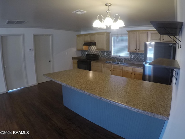 kitchen featuring decorative backsplash, light brown cabinets, black range with electric stovetop, and an inviting chandelier