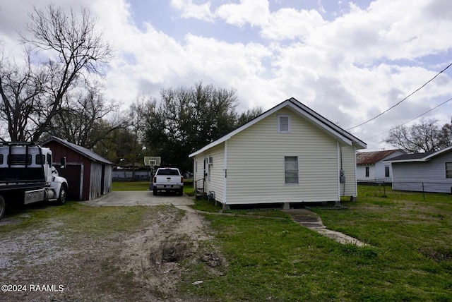 view of home's exterior featuring a yard