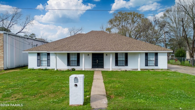 view of front of house with a front yard