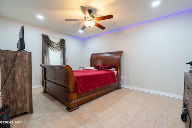 bedroom featuring ceiling fan and light tile floors