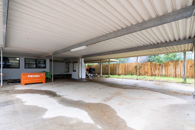 view of terrace with a carport