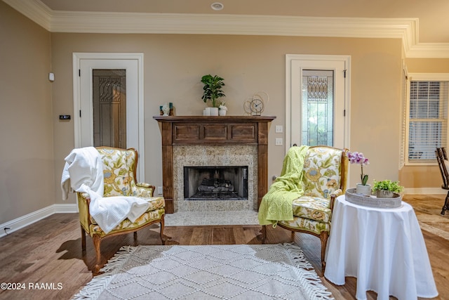 100 Giverny Pl, Lafayette, LA 70508 - living area featuring crown molding, wood finished floors, and a high end fireplace