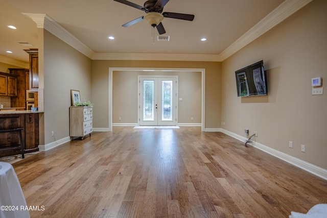 100 Giverny Pl, Lafayette, LA 70508 - unfurnished living room with ceiling fan, crown molding, light wood finished floors, french doors, and recessed lighting