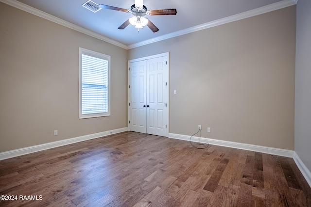 100 Giverny Pl, Lafayette, LA 70508 - unfurnished bedroom with wood finished floors, ornamental molding, a closet, and ceiling fan