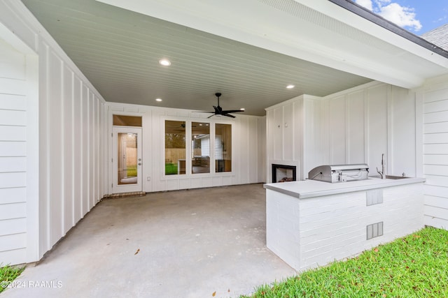 view of patio with ceiling fan