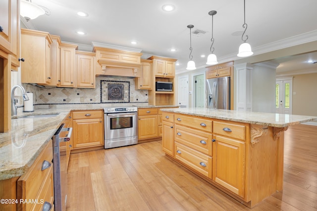 kitchen with appliances with stainless steel finishes, light hardwood / wood-style flooring, tasteful backsplash, and crown molding