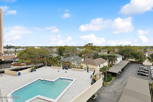 birds eye view of property with a residential view