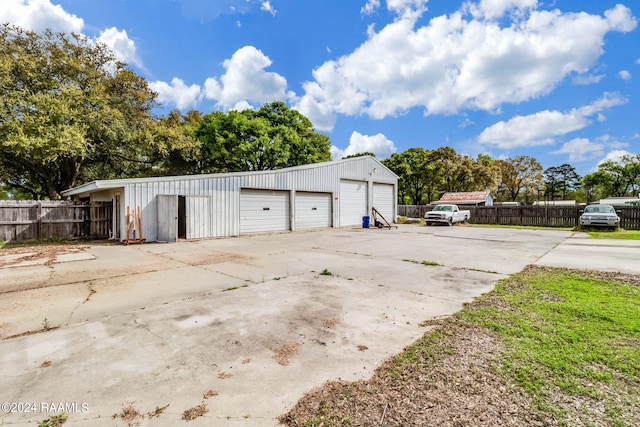 view of outdoor structure with a garage