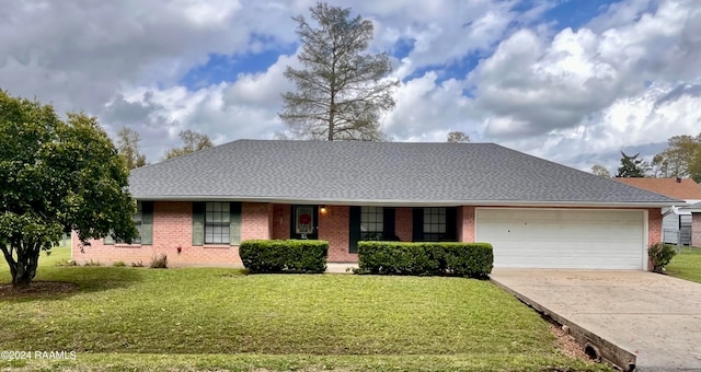 ranch-style house with a front lawn and a garage