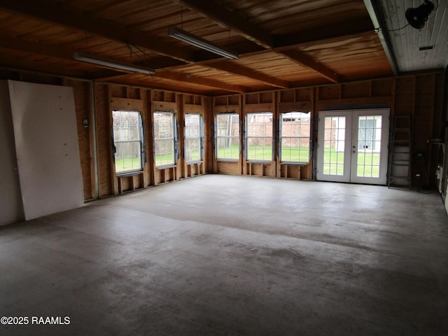 unfurnished sunroom with french doors and wooden ceiling