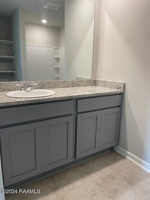 bathroom featuring vanity and tile patterned floors