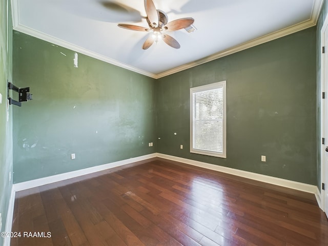 empty room featuring crown molding, ceiling fan, and hardwood / wood-style floors