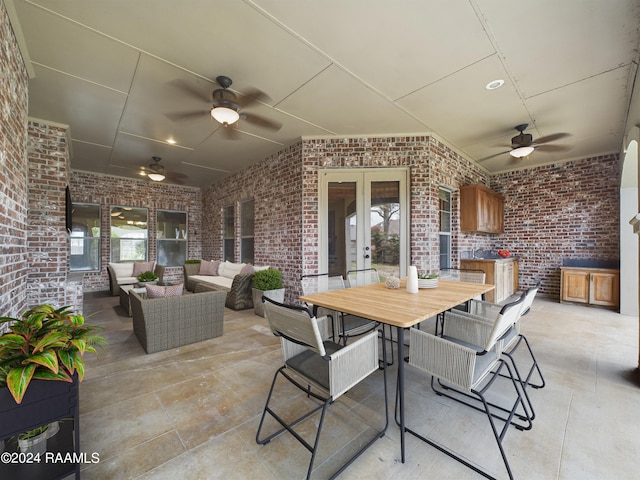 view of patio with an outdoor hangout area, french doors, and ceiling fan